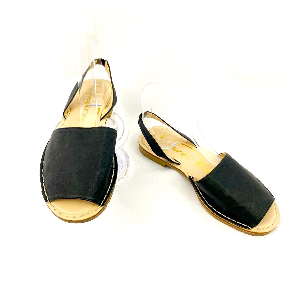 Modern Rush black sling back sandal.